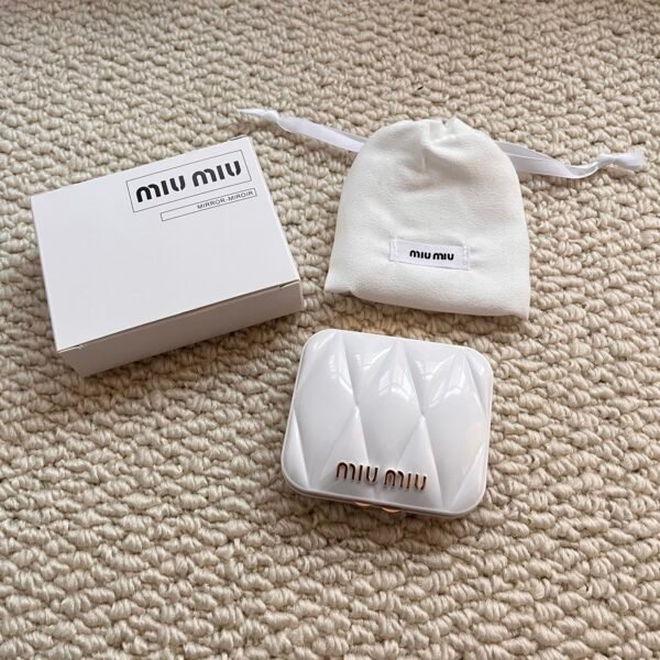 Miu Miu Mirror: Elegant Reflection